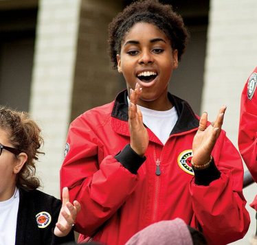 Students clapping.